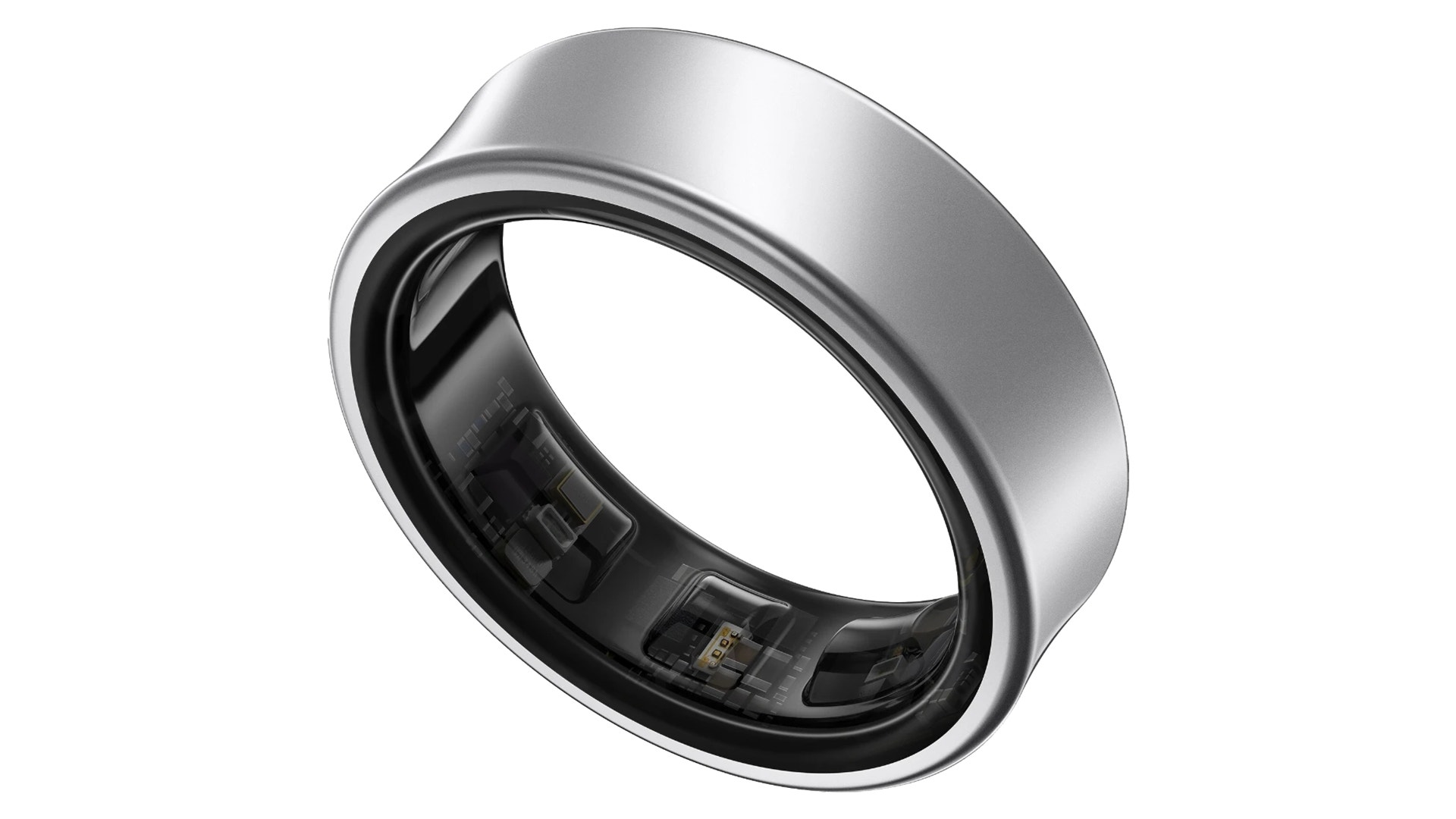 En silverfärgad smart ring fotograferad från sidan, visar metallisk yttersida och svart insida med elektroniska komponenter.