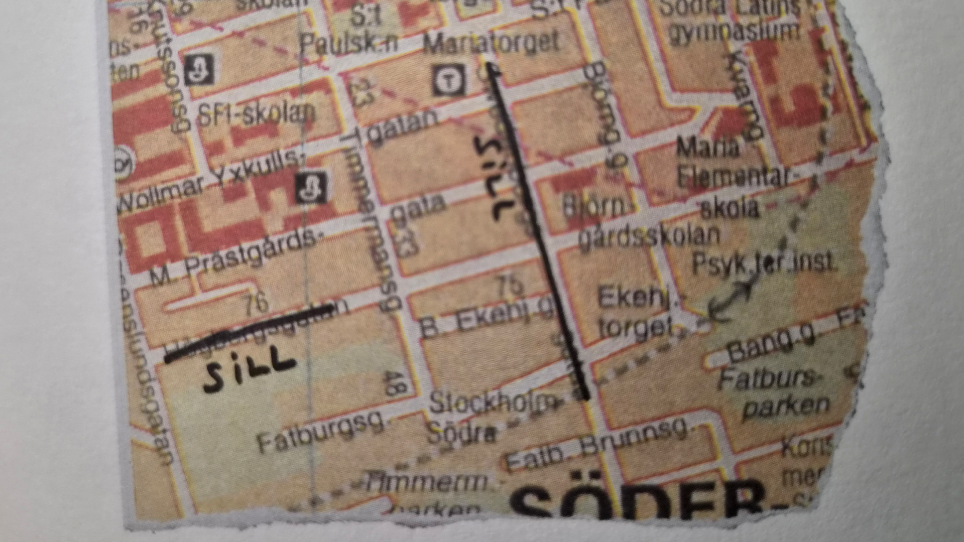 Fragment av en vintage-karta över Stockholm med svenska ortnamn och gatnamn.