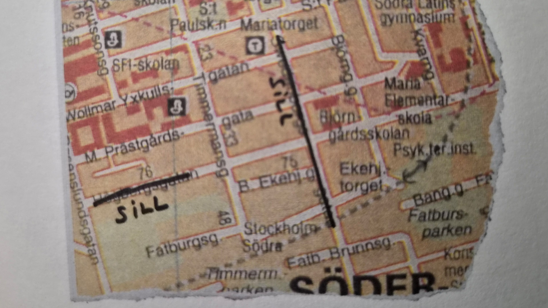 Fragment av en vintage-karta över Stockholm med svenska ortnamn och gatnamn.