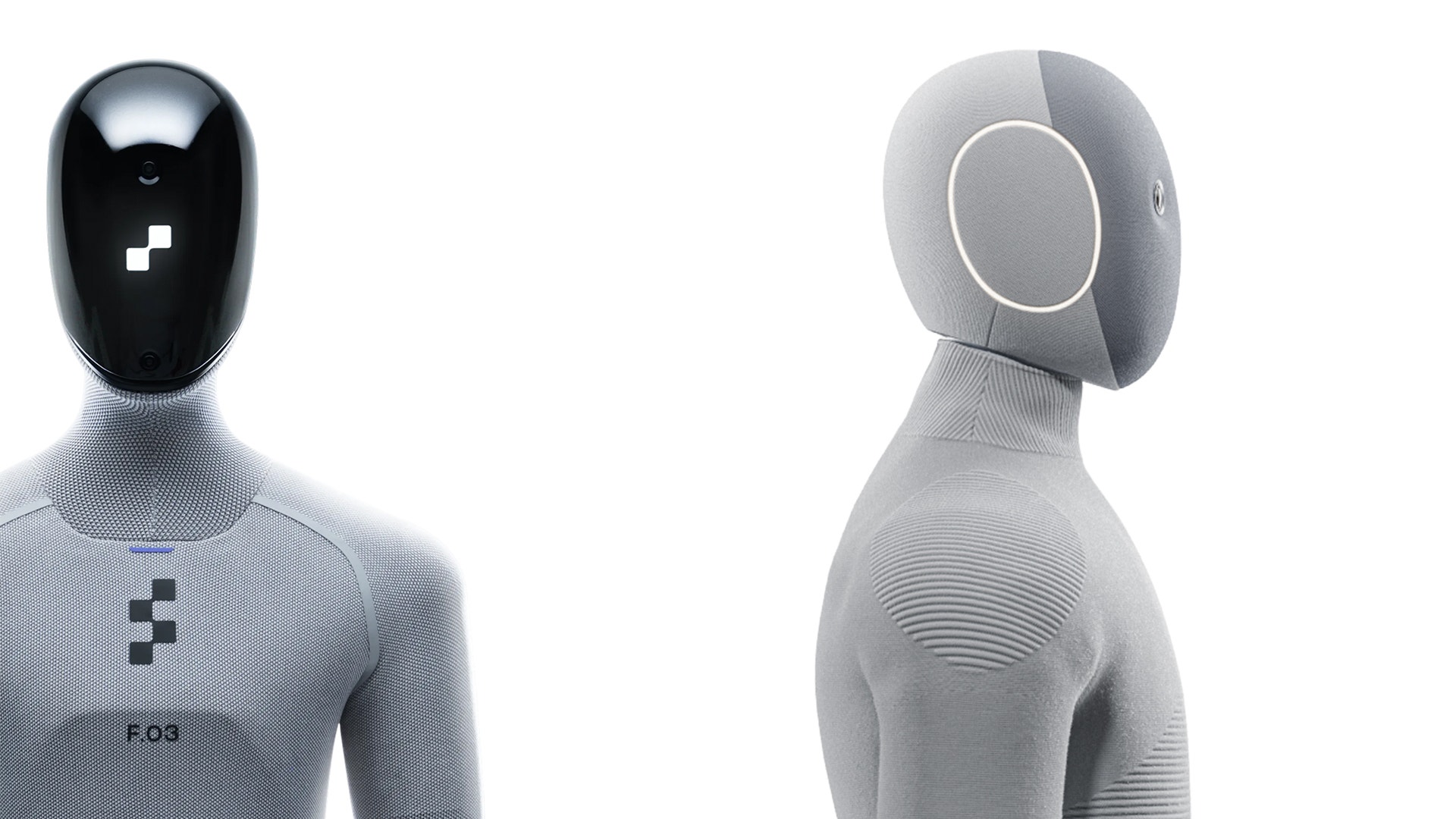 Två humanoidala robotar visade framifrån och från sidan. De har grå kroppar med svarta huvuden och en minimalistisk design.