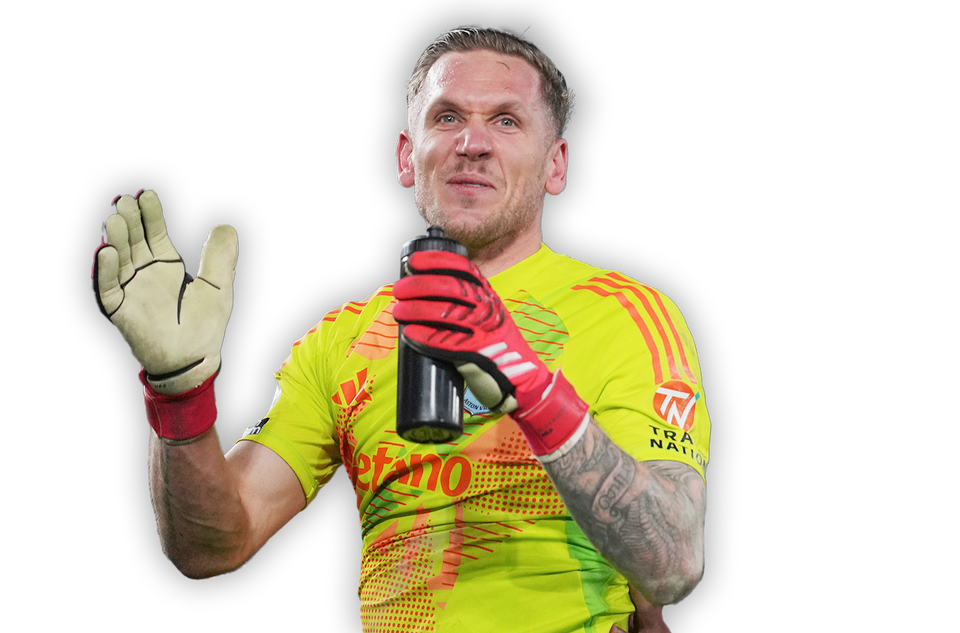 Svenska målvakten Robin Olsen i en gul matchtröja med sponsorn Betano över bröstet.