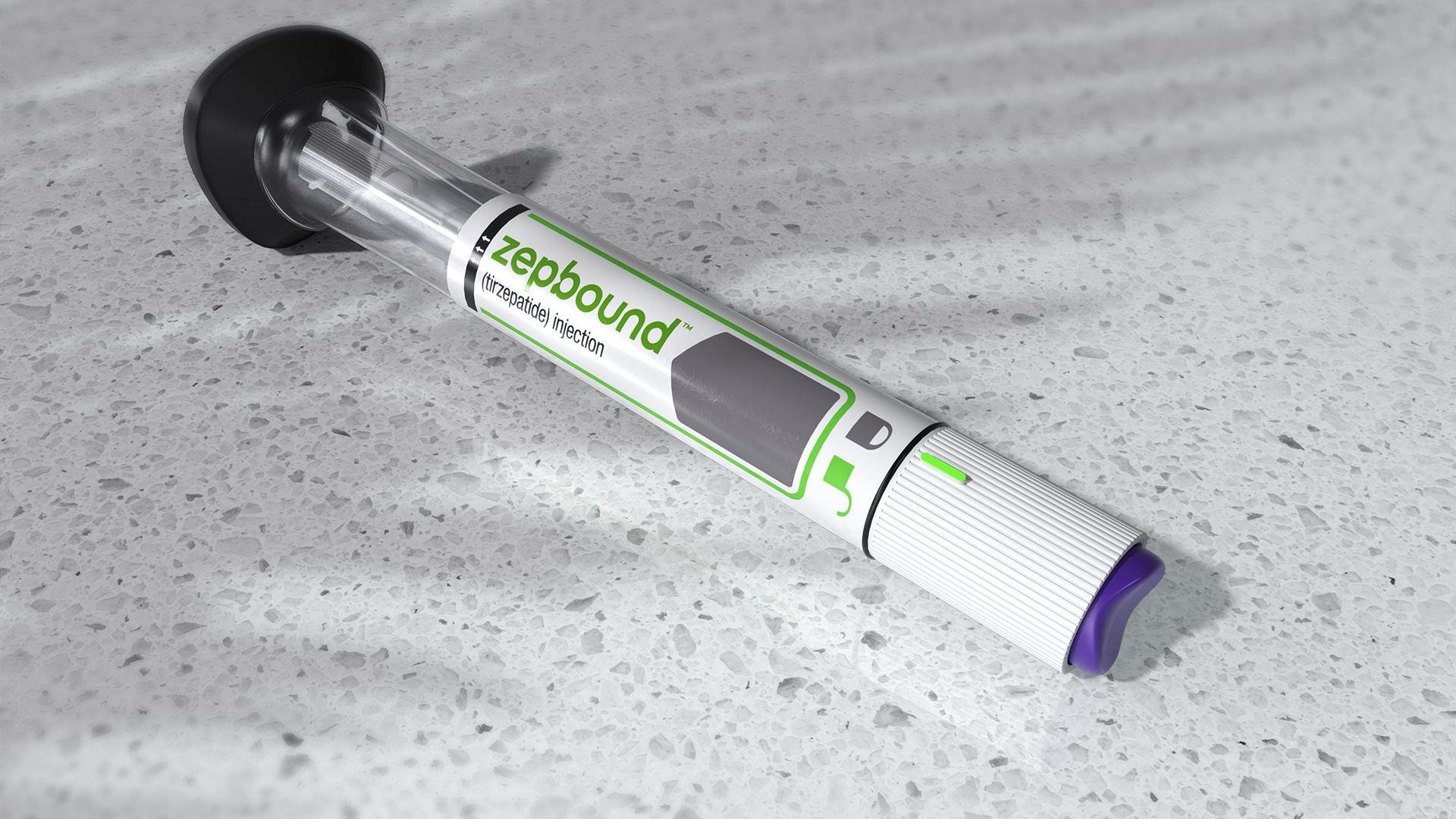 En medicinsk spruta med grön etikett ligger på en betongyta.